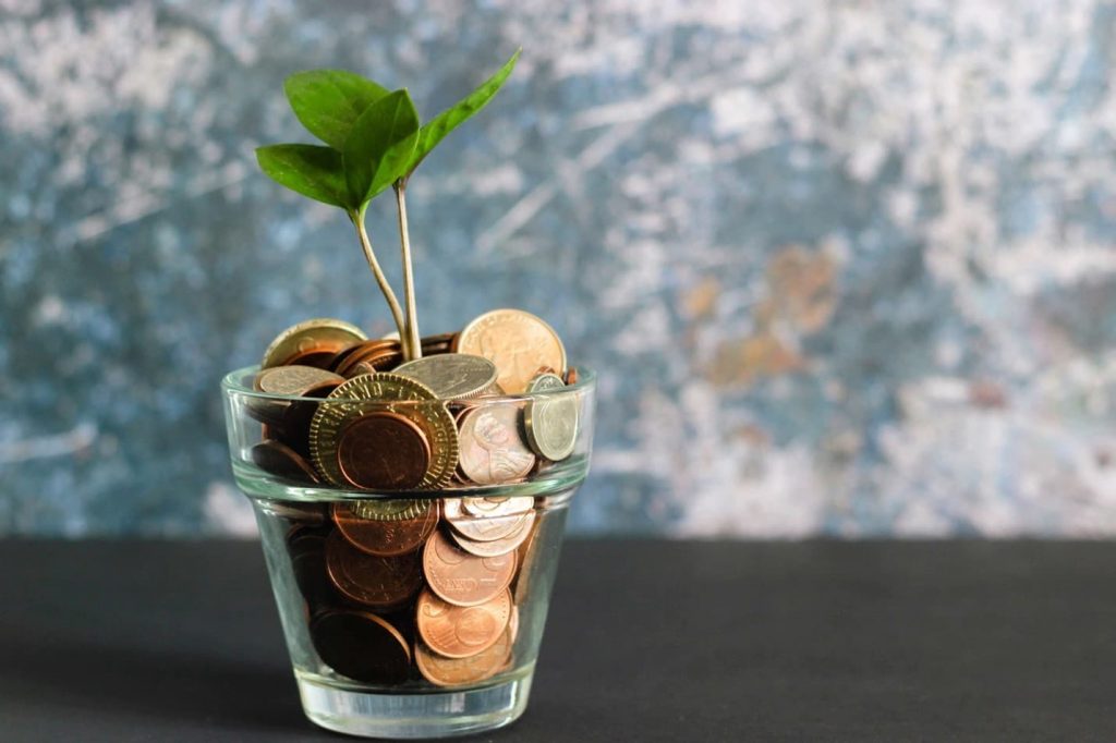 Coins in a Jar - Photo by Micheile Henderson on Unsplash